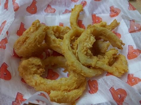 In another bowl, beat egg yolk, then stir in milk and vegetable oil. . Popeyes onion rings recipe